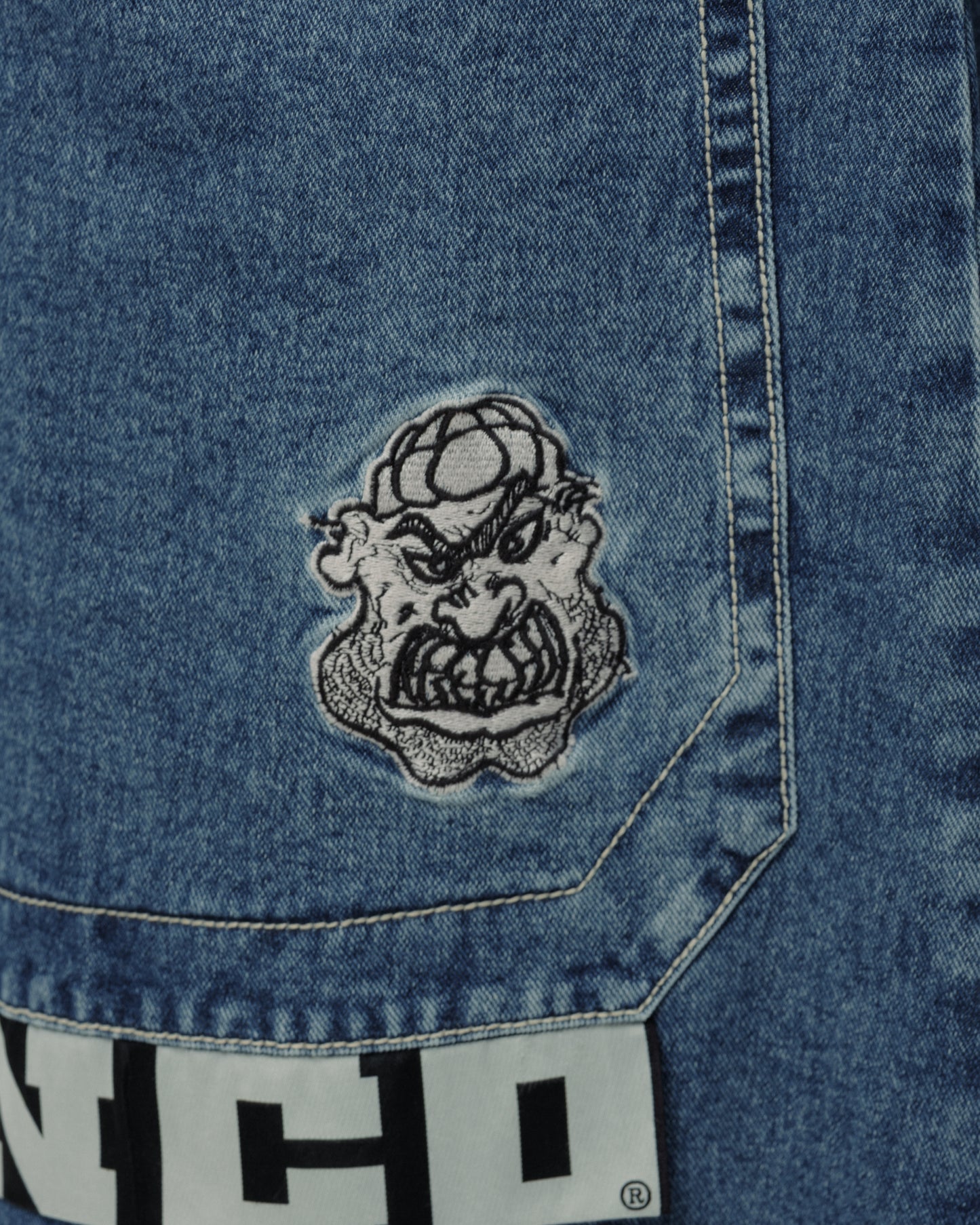 Thug. 50". Dark Stone.