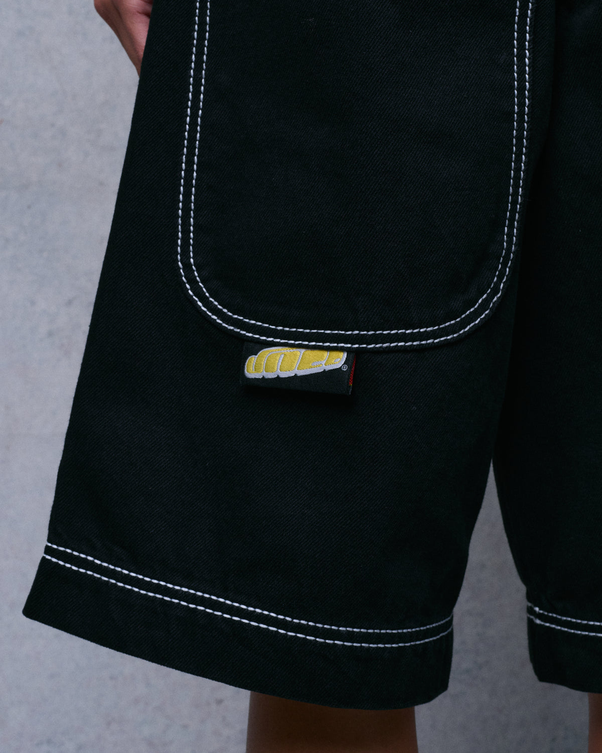 W101 Twin Cannon Shorts. 14". Black/Silver J.