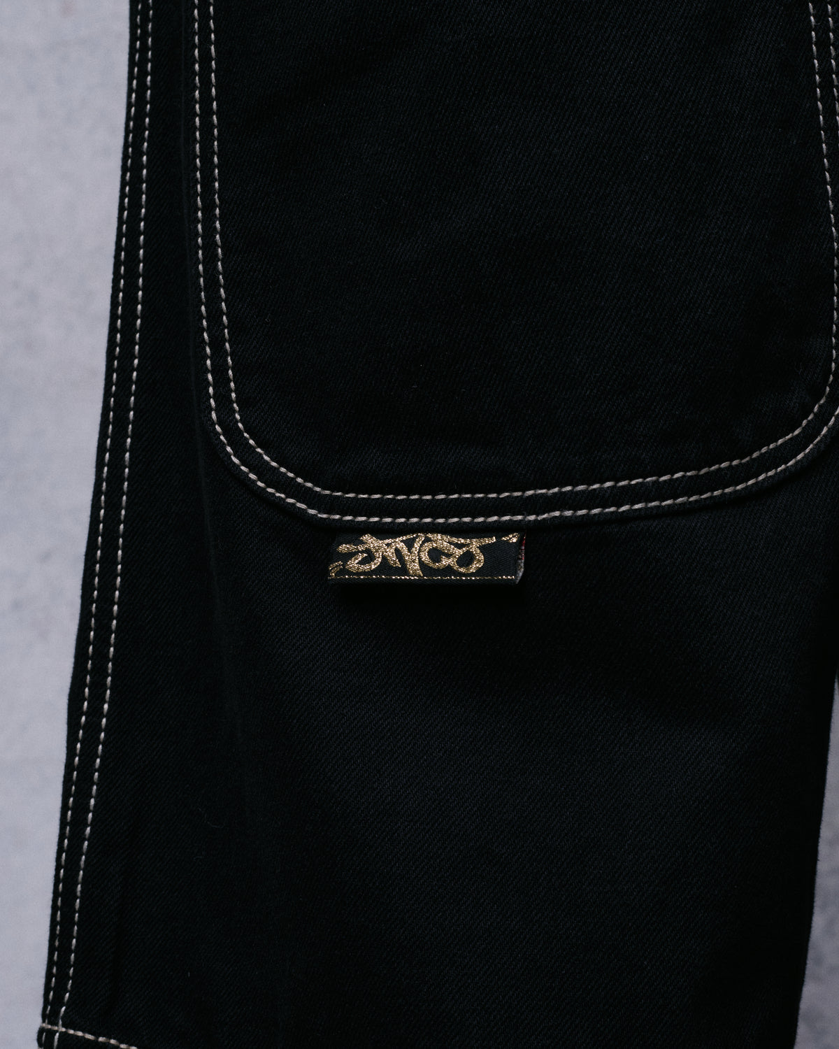 W101 Twin Cannon Shorts. 14". Black/Gold J.