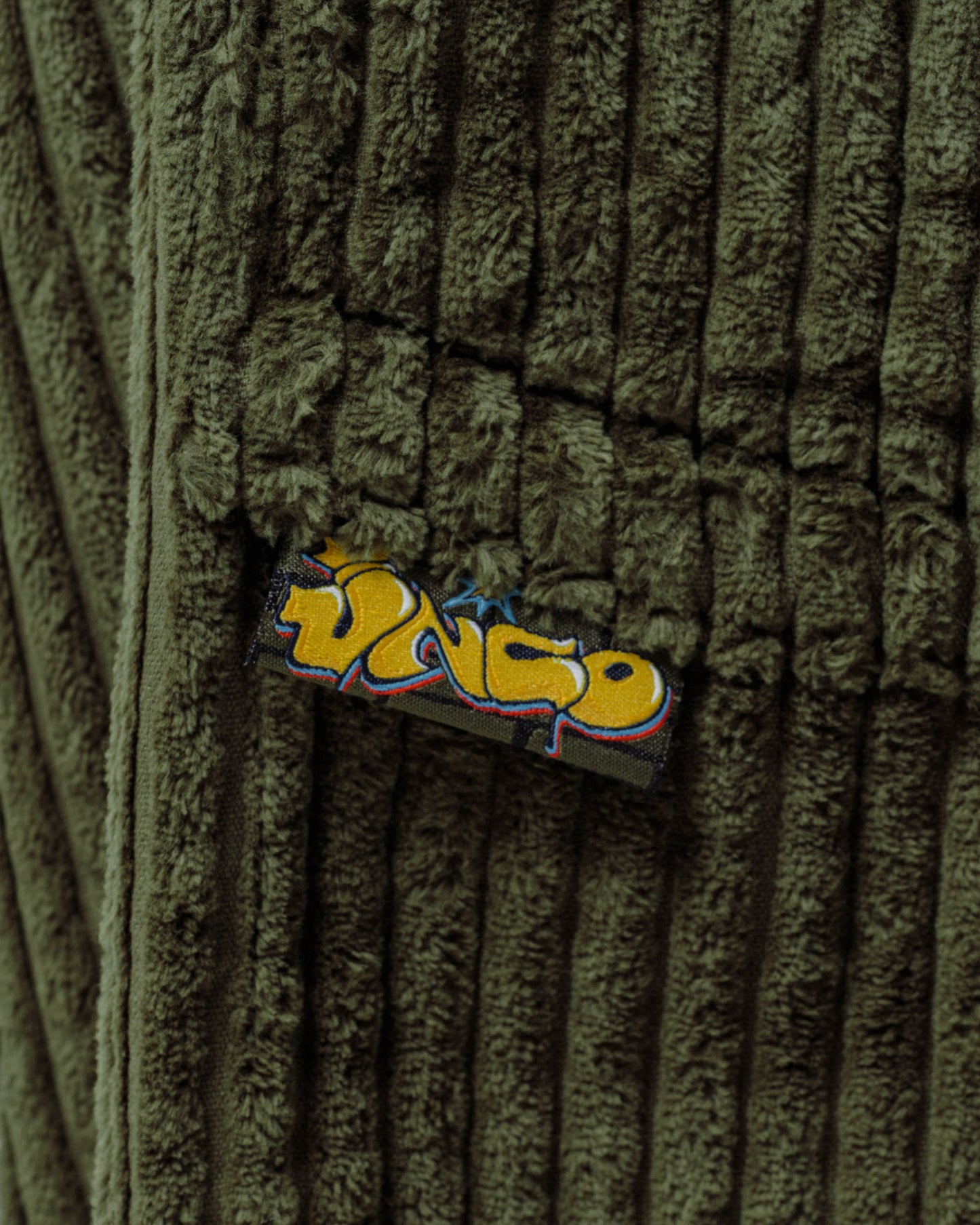 W Jester. 26". 2 Wale Corduroy. Moss.