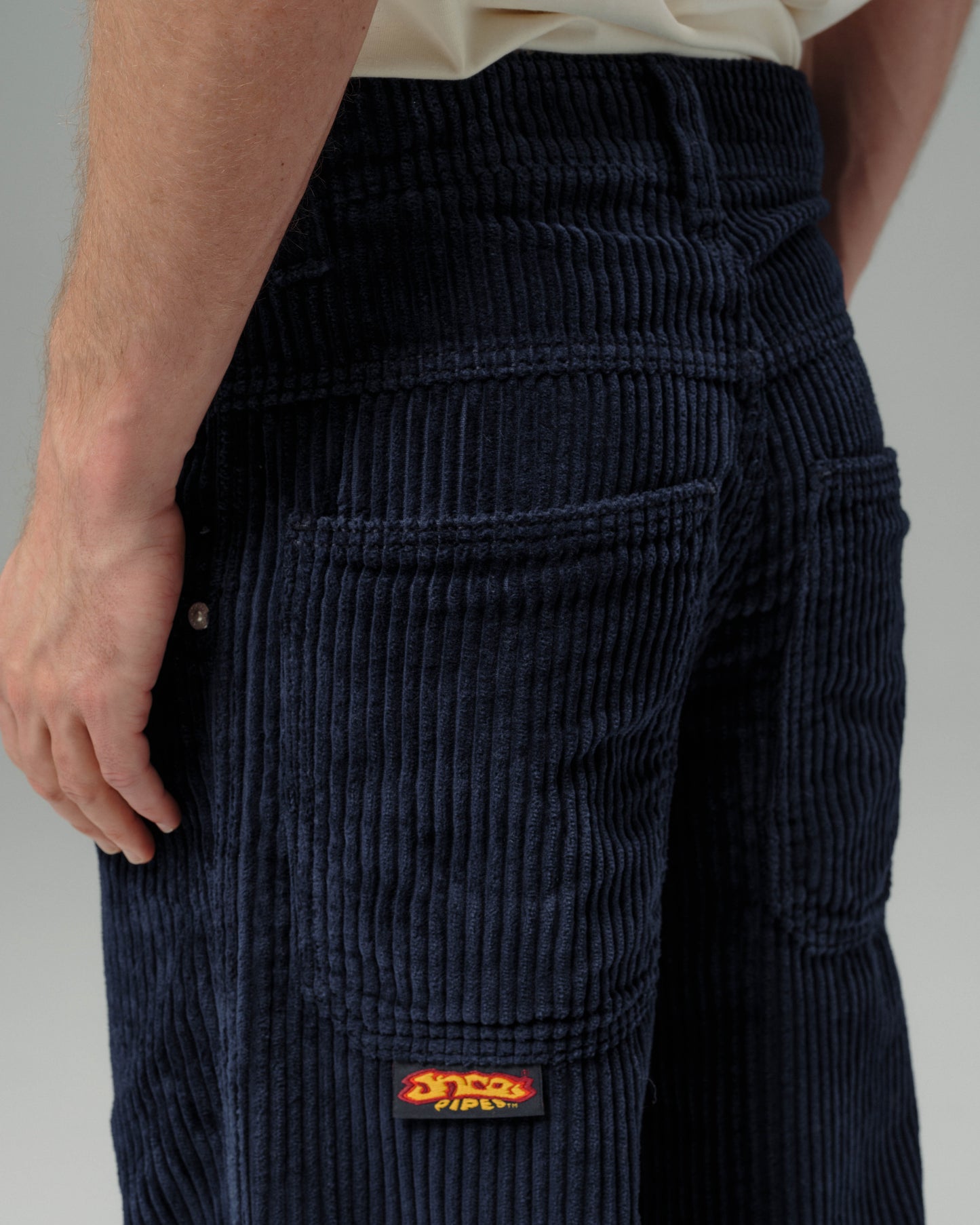 179 Pipes. 23". 4 Wale Corduroy. Navy.