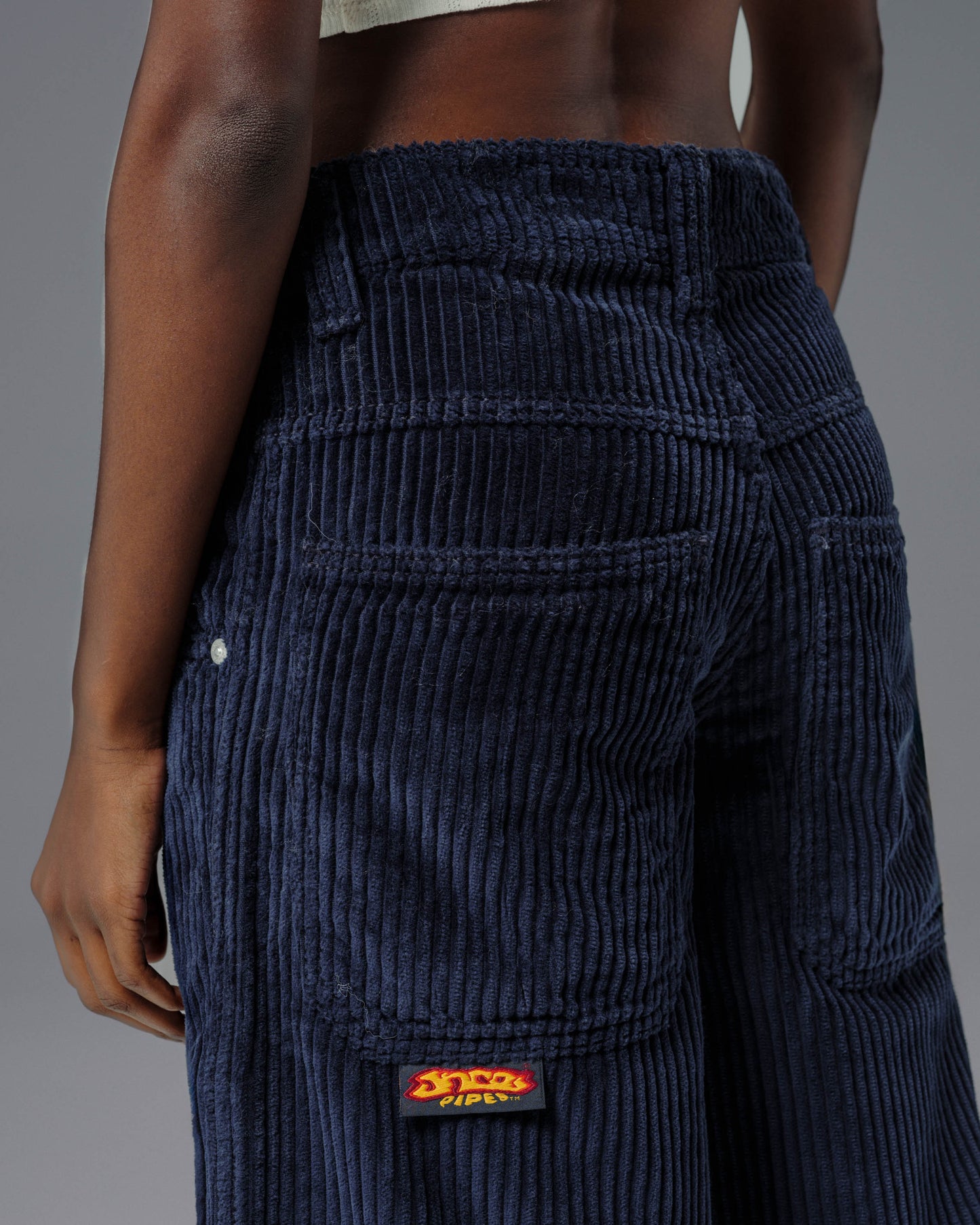 W179 Pipes. 23". 4 Wale Corduroy. Navy.